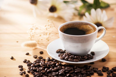 Close-up of coffee cup on table