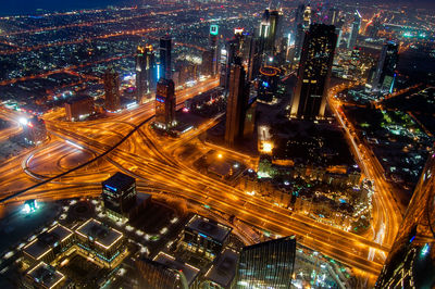 Aerial shot of illuminated cityscape