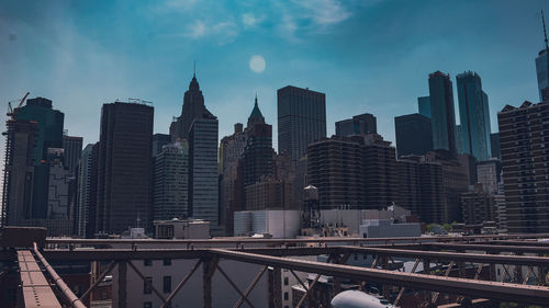 Modern buildings in city against sky