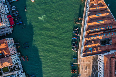 Top down view of moored empty venetian gondolas