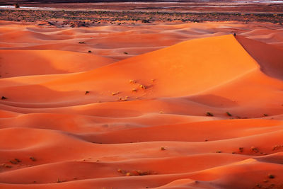 Scenic view of sand dunes at erg chebbi desert during sunset