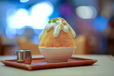 Close-up of dessert in plate on table