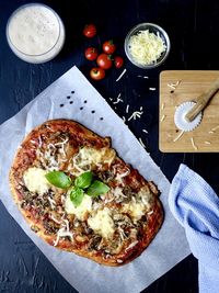 High angle view of pizza on table