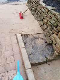 Low section of woman on footpath