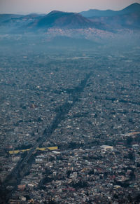 High angle view of city street against sky