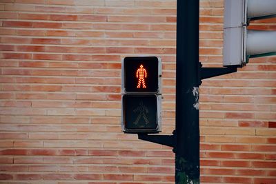 Illuminated sign on wall