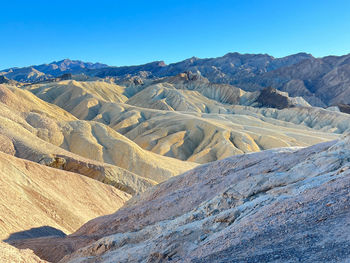 Scenic view of mountains against clear sky