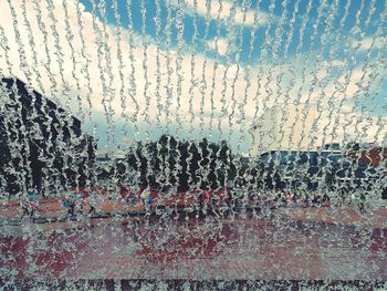 Close-up of raindrops on glass window