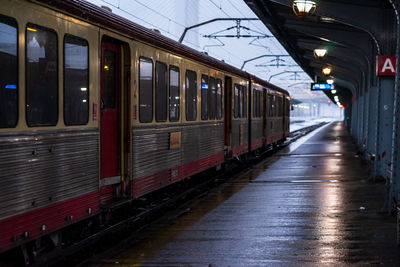 Train at railroad station in city