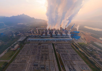 High angle view of city buildings during sunset