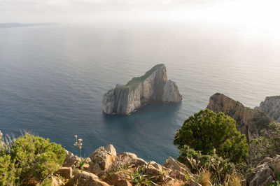 High angle view of rocks in sea