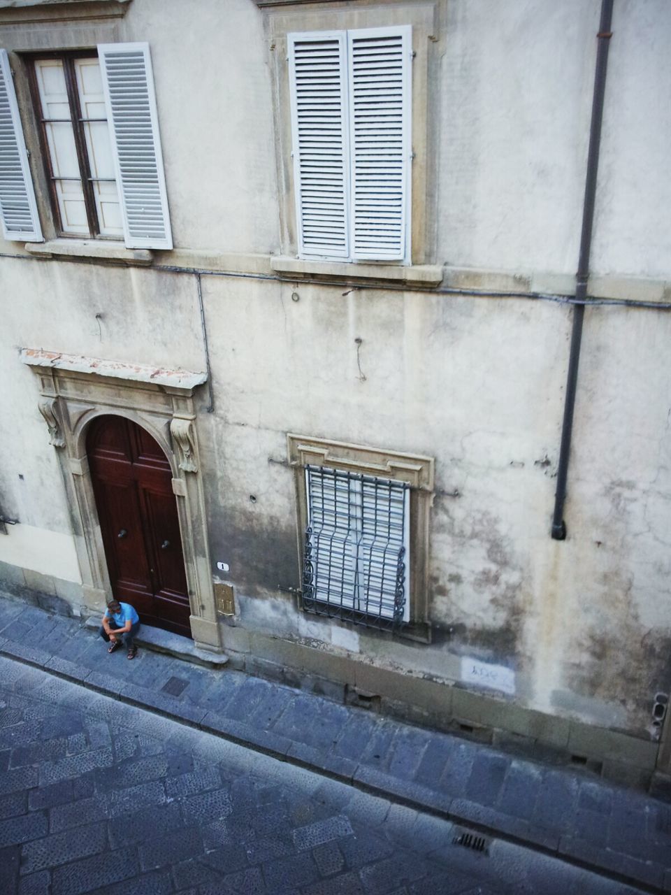 building exterior, architecture, built structure, window, door, residential building, building, house, residential structure, street, day, closed, city, outdoors, entrance, no people, sidewalk, wall, transportation, facade