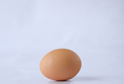 Close-up of apple against white background