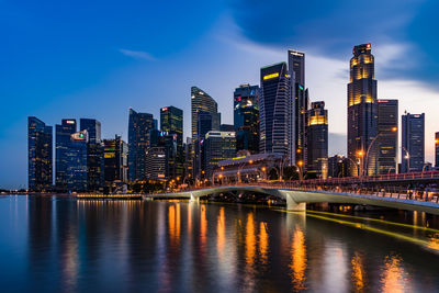 Illuminated city at waterfront