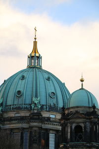 Berlin cathedral against cloudy sky