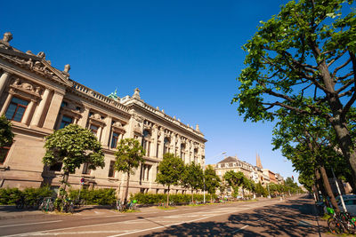 Low angle view of building against clear blue sky