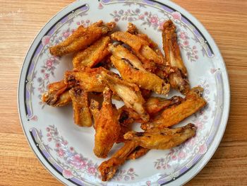 High angle view of meat in plate on table