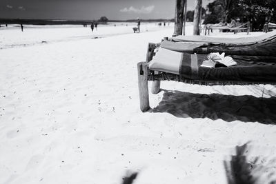 Scenic view of beach against sky during winter