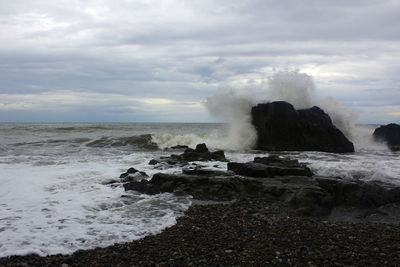 Stormy seascape, waves and wind in the black sea of georgia. drops ans splashes.