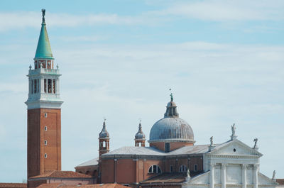 View of cathedral and buildings against sky