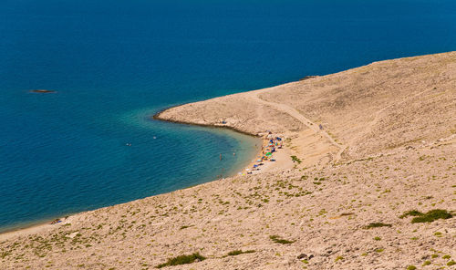 High angle view of beach against blue sky