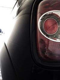 Reflection of car on side-view mirror