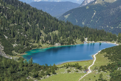 Scenic view of seebensee lake by mountains