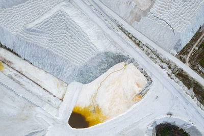 Aerial sunny view of phosphogypsum mountains in kedainiai city, industrial area, lithuania