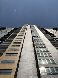 Low angle view of modern building against clear sky