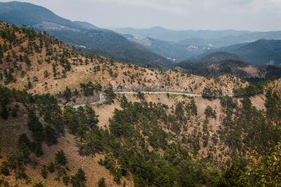 High angle view of landscape and mountains against sky