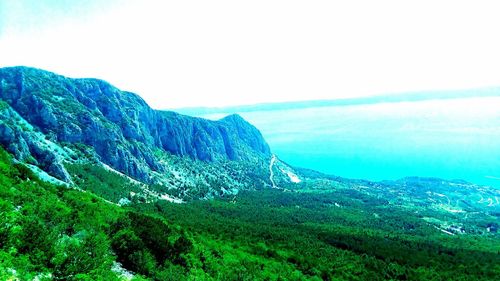 Scenic view of mountains against clear sky