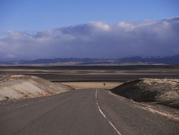 Road by landscape against sky, pampas argentina 