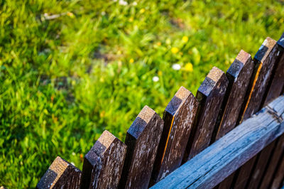 Close-up of wooden fence against plants