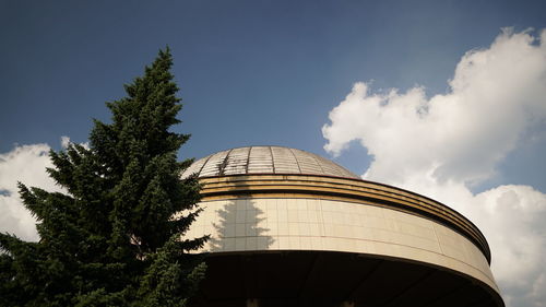 Low angle view of water tower against sky