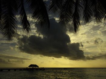 Scenic view of sea against sky at sunset