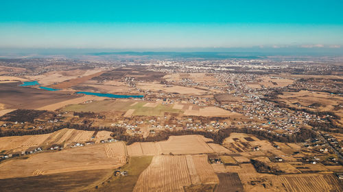 Aerial view of townscape against sky