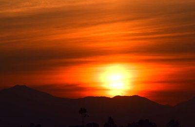 Scenic view of mountains at sunset