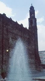 Castle against sky in city