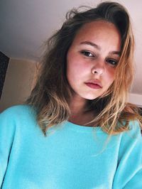 Portrait of beautiful woman at home