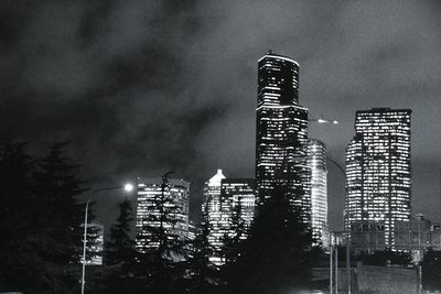 Cityscape against sky at night