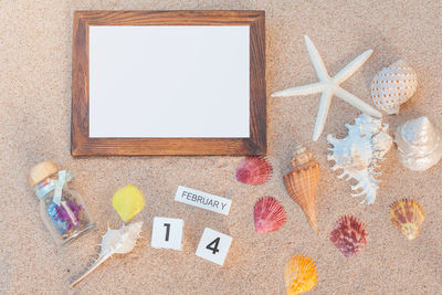 High angle view of text on beach