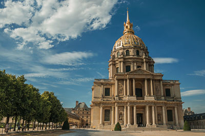 Front facade of les invalides palace with the golden dome in paris. the famous capital of france.