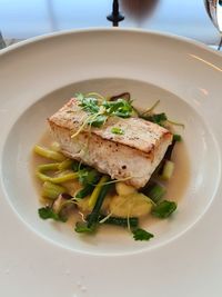 Close-up of fish served in plate on table