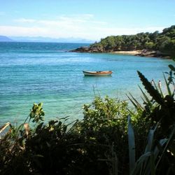 Scenic view of calm sea against sky