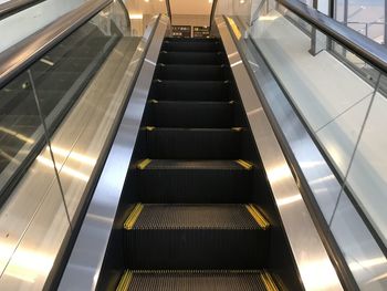 Low angle view of escalator in building