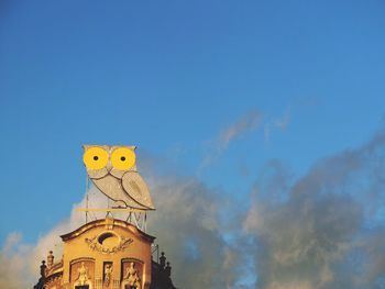 Low angle view of built structure against blue sky