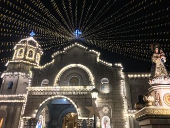 Illuminated christmas tree at night