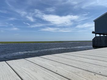 Pier on sea against sky