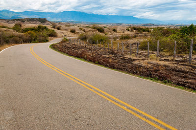 Road leading towards mountains
