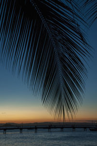 Scenic view of sea against clear sky during sunset